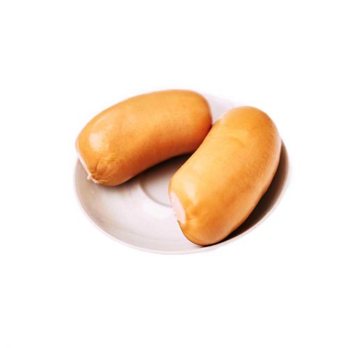 Zwei kleine Fleischwürste liegen auf einem Teller.