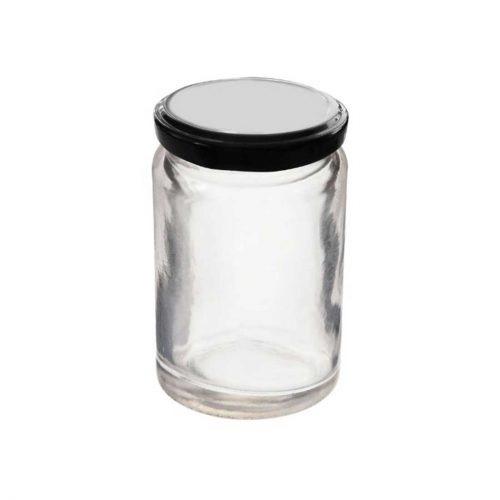 Ein leeres Hochrandglas mit schwarzem Deckel